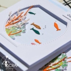 Carte de scrapbooking sur le thème de la mer avec des poissons et des coraux dans un aquarium.